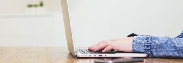 close-up-of-hands-on-laptop_23-2147601487-860239-edited.jpg